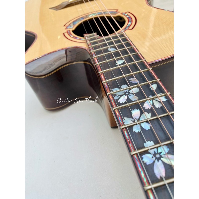 Đàn guitar custom cẩm ấn khảm xà cừ có lắp EQ