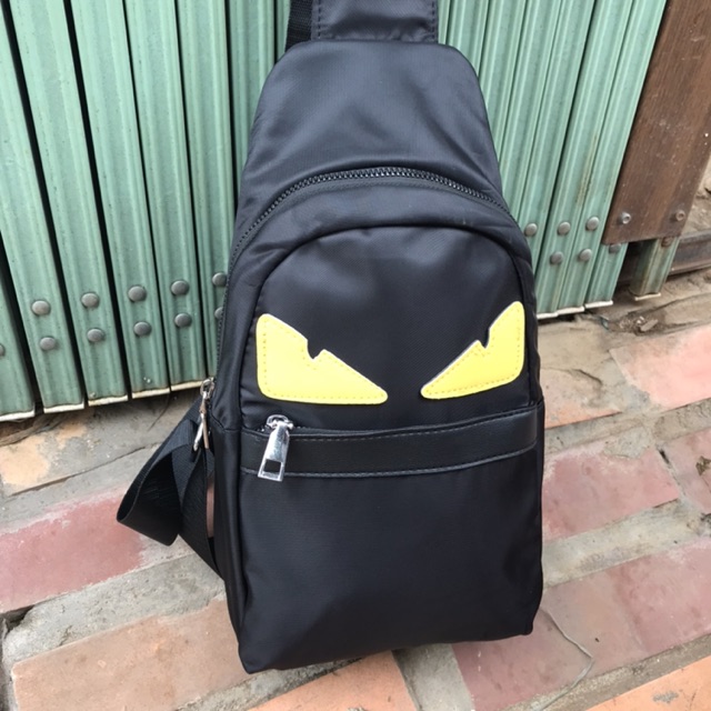 Túi đeo chéo mắt vàng | BigBuy360 - bigbuy360.vn