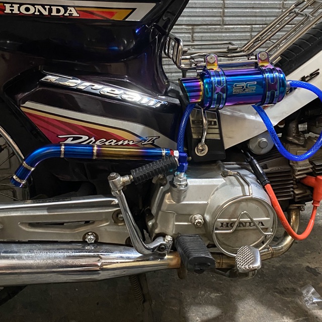 cây thông hơi titan xe máy