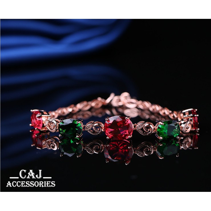 Vòng tay Grania với viên đá Zircon đỏ to ở giữa và 4 viên đá xanh vả đỏ chia đều 2 bên CVT-108