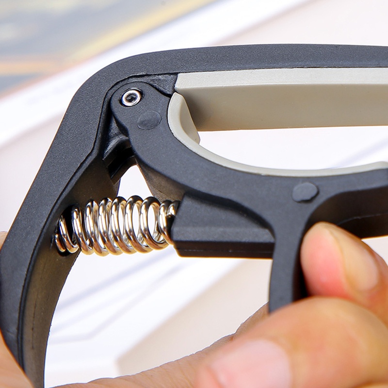 Capo 4 Dây Đàn Guitar 6 Dây Bằng Nhựa Nylon Và Silicone Tiện Dụng