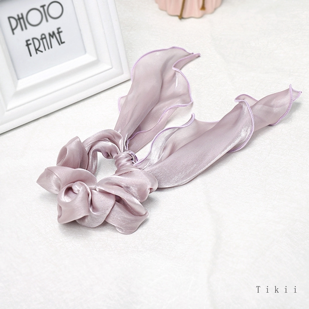 Buộc tóc thời trang nữ tính