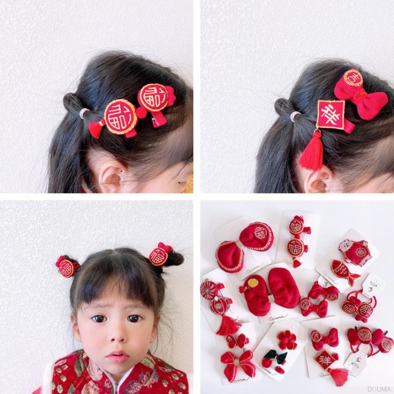 Kẹp tóc hình chúc mừng năm mới đáng yêu cho bé