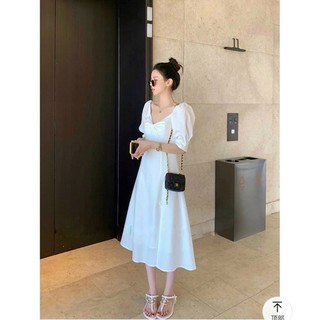 Váy trắng nơ ngực xẻ đùi