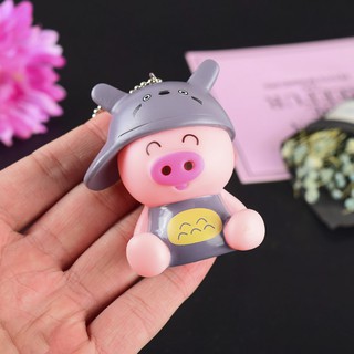Móc khoá heo ngồi đội mũ
