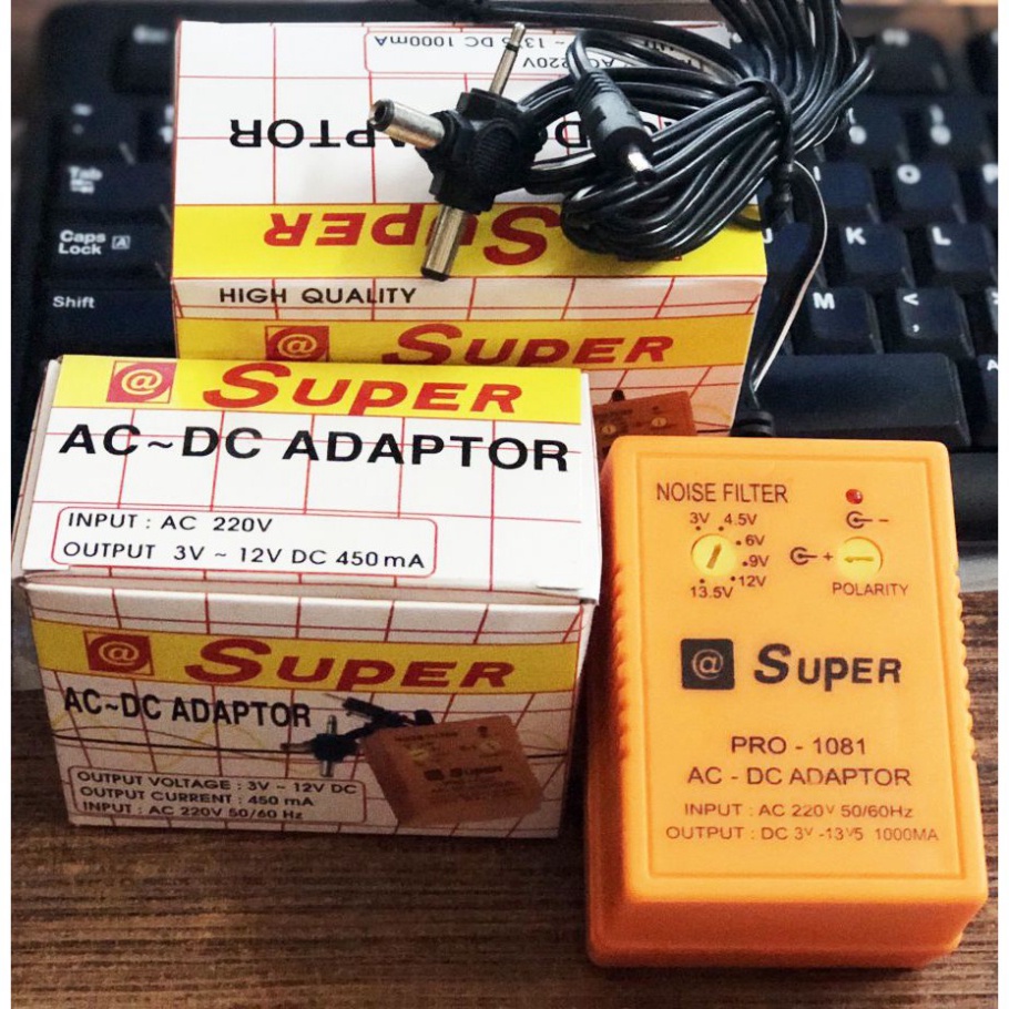 Nguồn Adapter đa năng SUPER 1000mA 1081 ,6 đầu ra 3V 4.5V 6V 9V 12V DC đảo cực được (Cam)