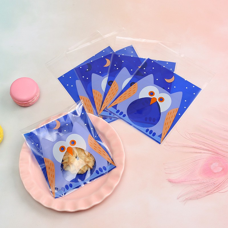 Set 100 túi nhựa đựng bánh kẹo in hình dễ thương