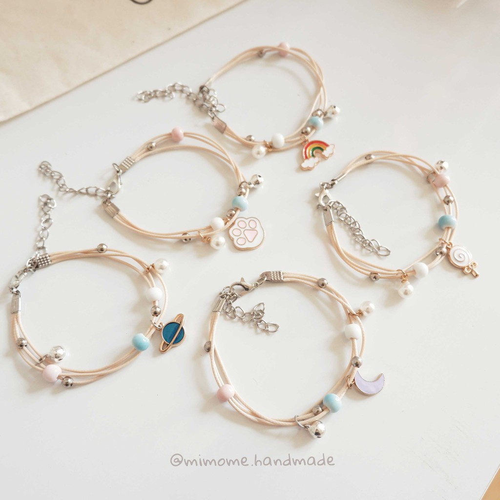 Vòng gốm phối charm màu móc kim loại