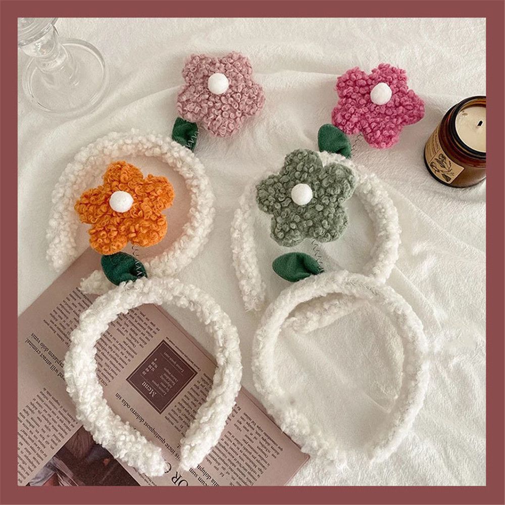 Băng đô bằng len đính hoa dẽ thương