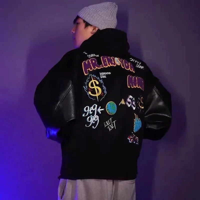 Áo Khoác Bomber Kaki Nam Nữ Phối Tay Da T-A-N From Rộng Hàn Quốc Hình Thêu Nét AKD10. Màu Đen