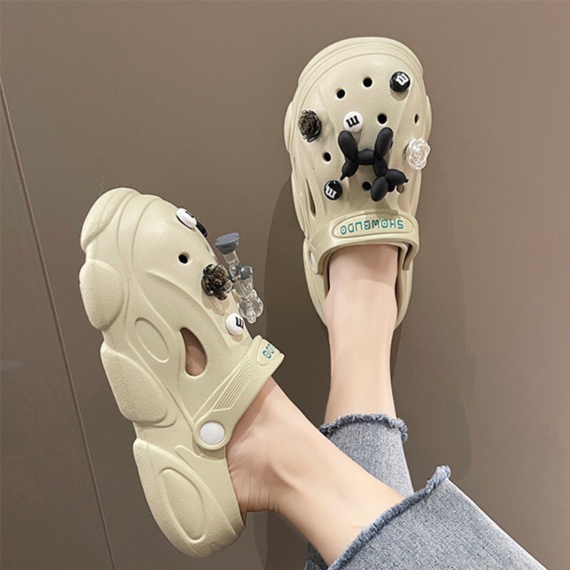 Dép Cross nữ Showbudo cao 4cm, Sục nữ độn đế kèm Sticker chất liệu Eva Hottrend 2022