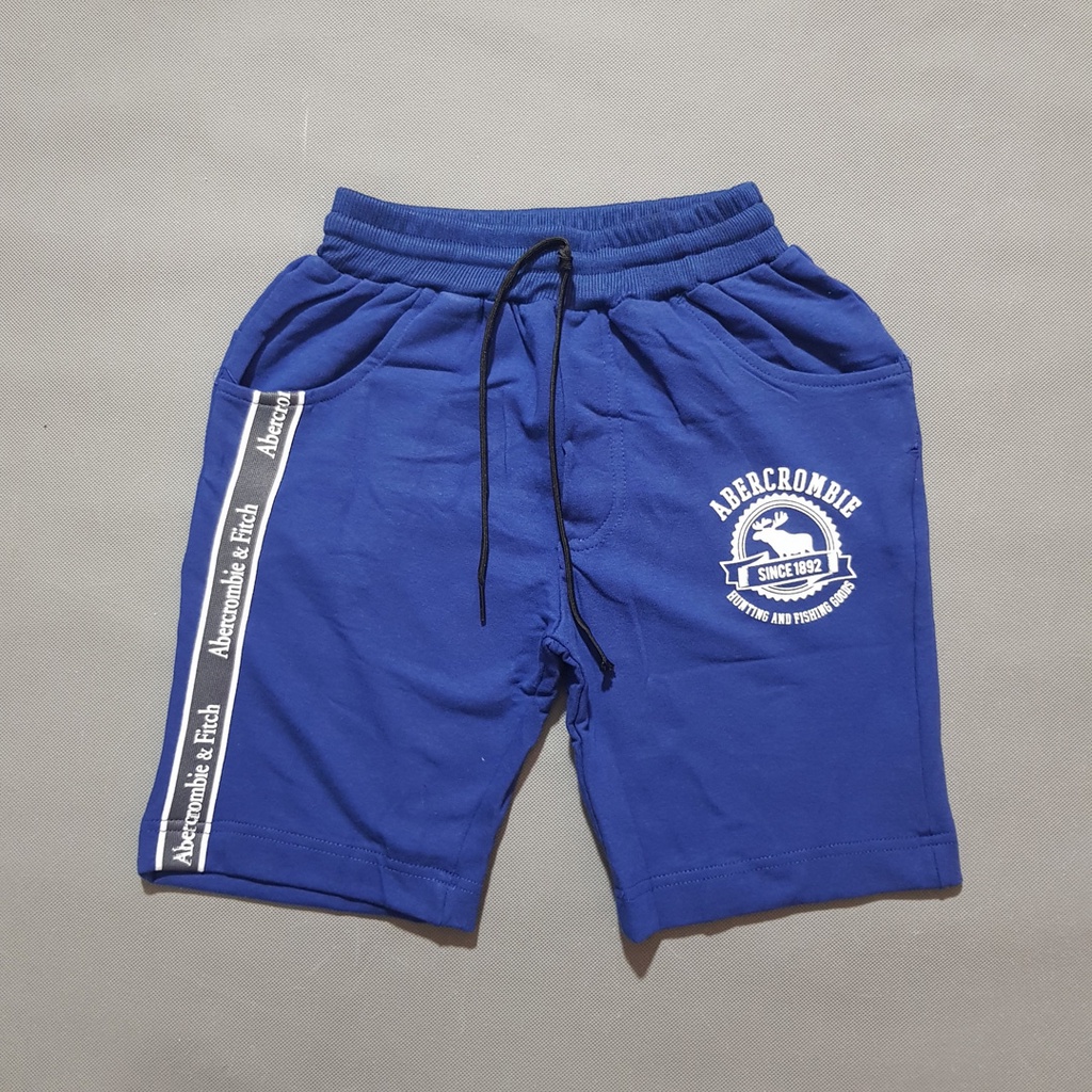 Quần thun cotton da cá thể thao phối chữ sọc bé trai lớn