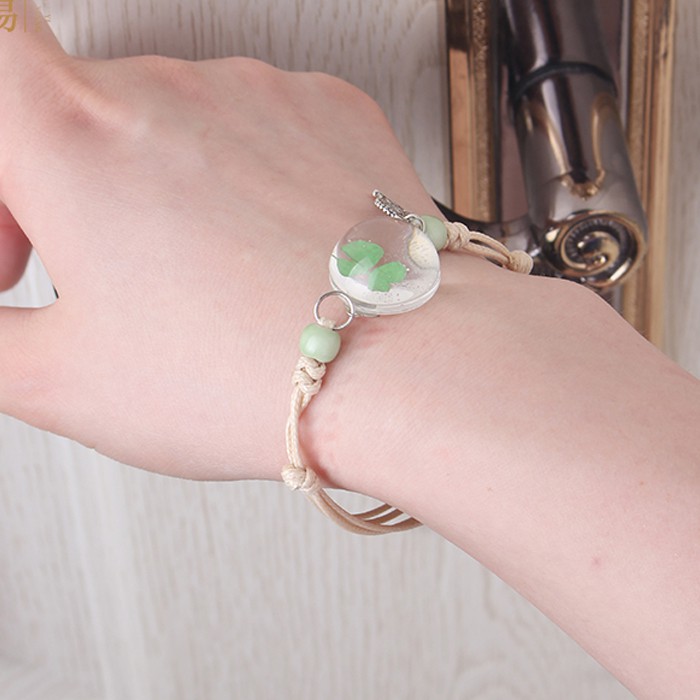 Vòng tay bện dây mặt hình quả bóng trong suốt phối hoa khô dễ thương cho nữ | BigBuy360 - bigbuy360.vn