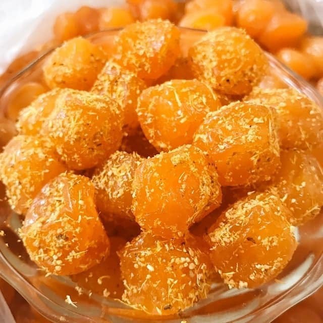 Ô mai mơ nho gừng hộp 500g.