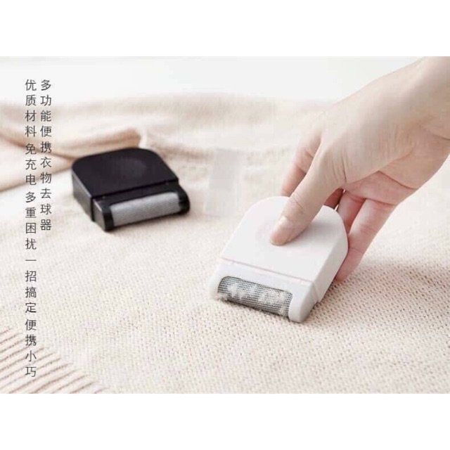 Xén lông xù quần áo