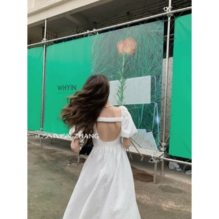 Váy gấm hoa hở lưng