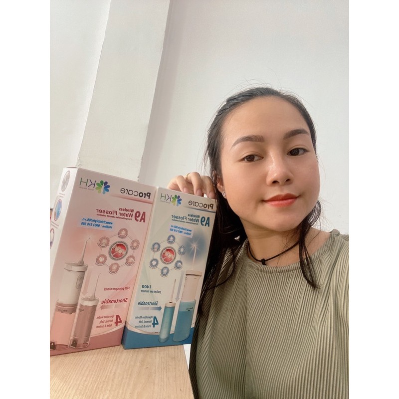 Máy Tăm nước procare A9 chính hãng màu xanh và màu hồng