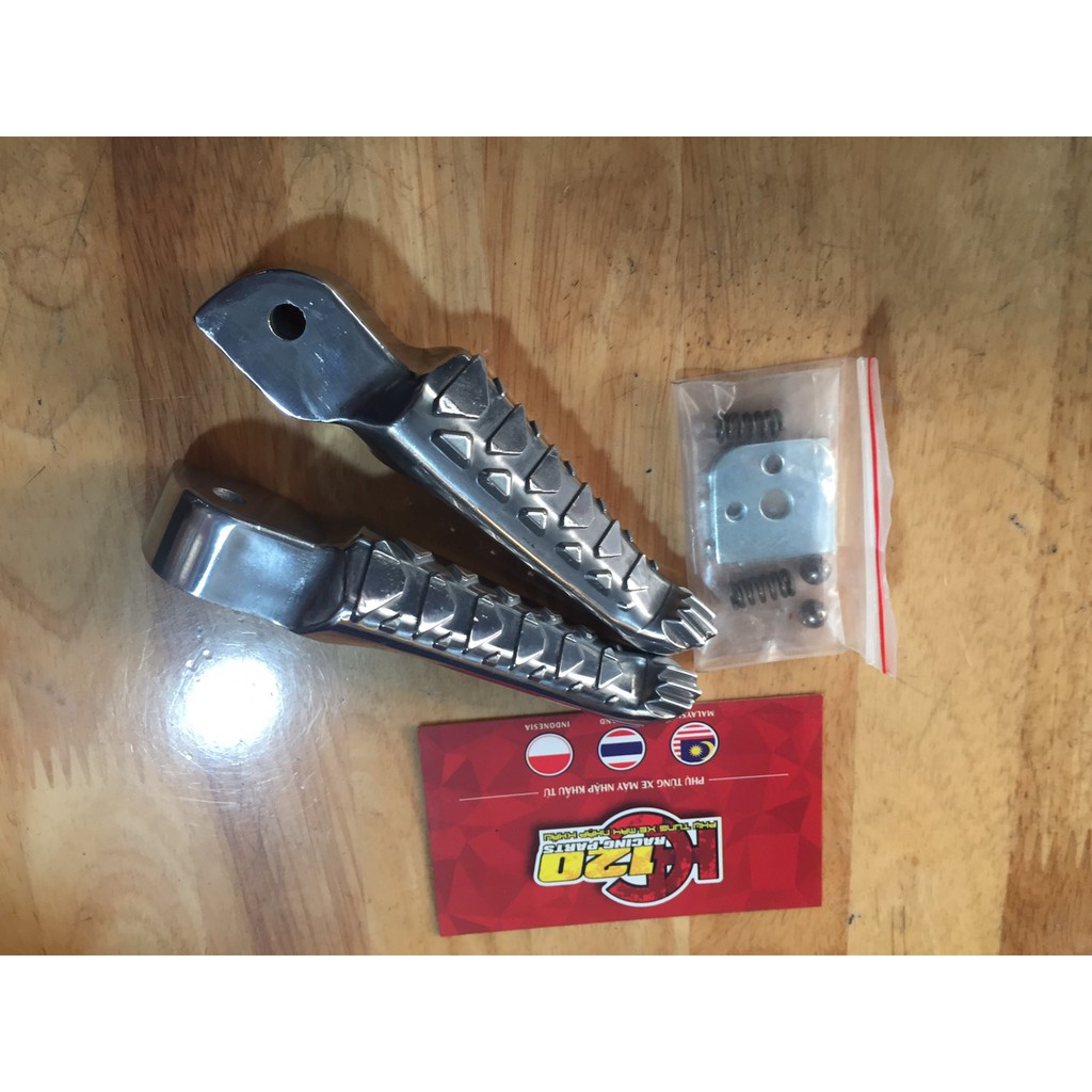 Gác chân nhôm sau xương cá raider-honda
