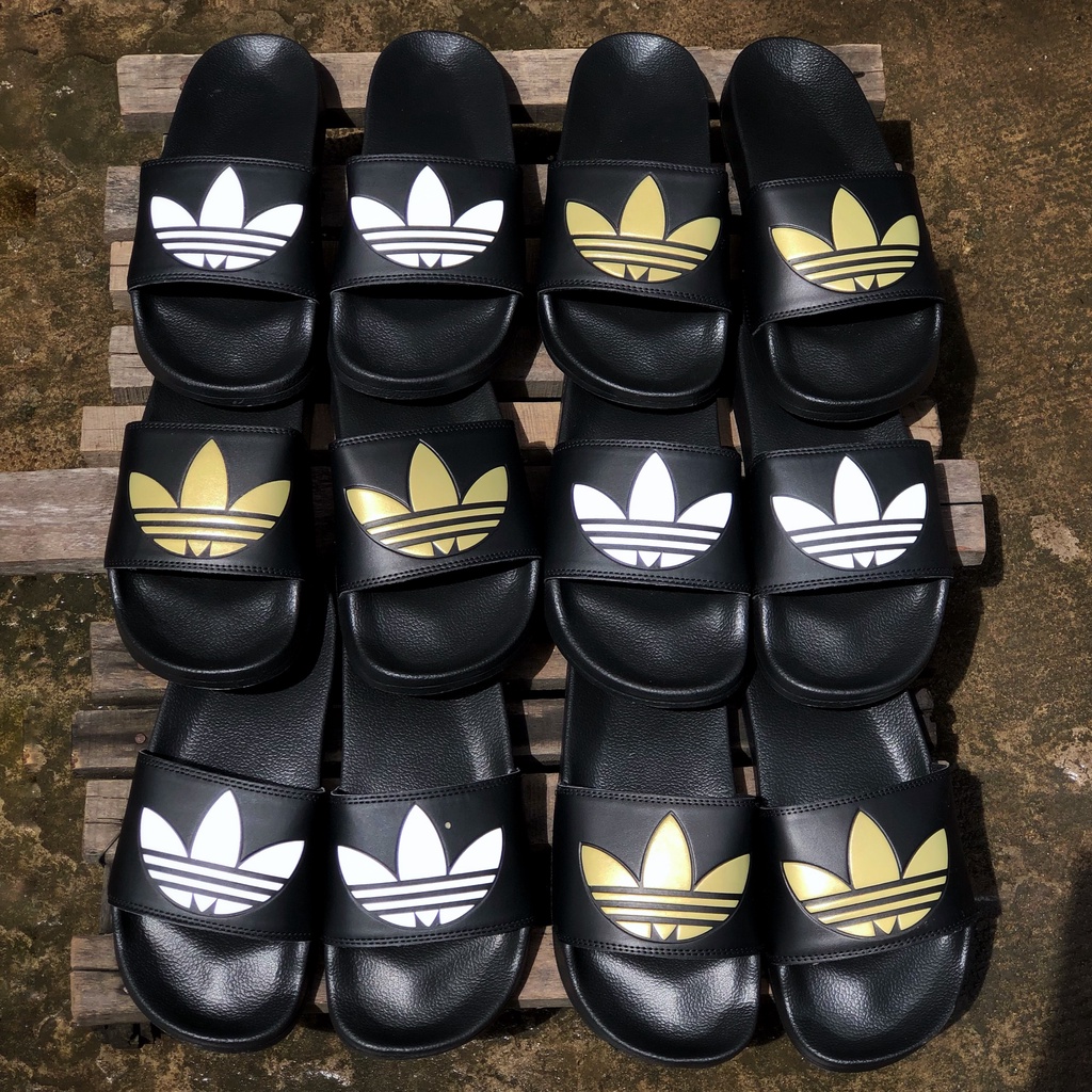 Dép quai ngang Adidas Lite đen big logo Trắng/Gold, dép cao su logo cỏ ba lá