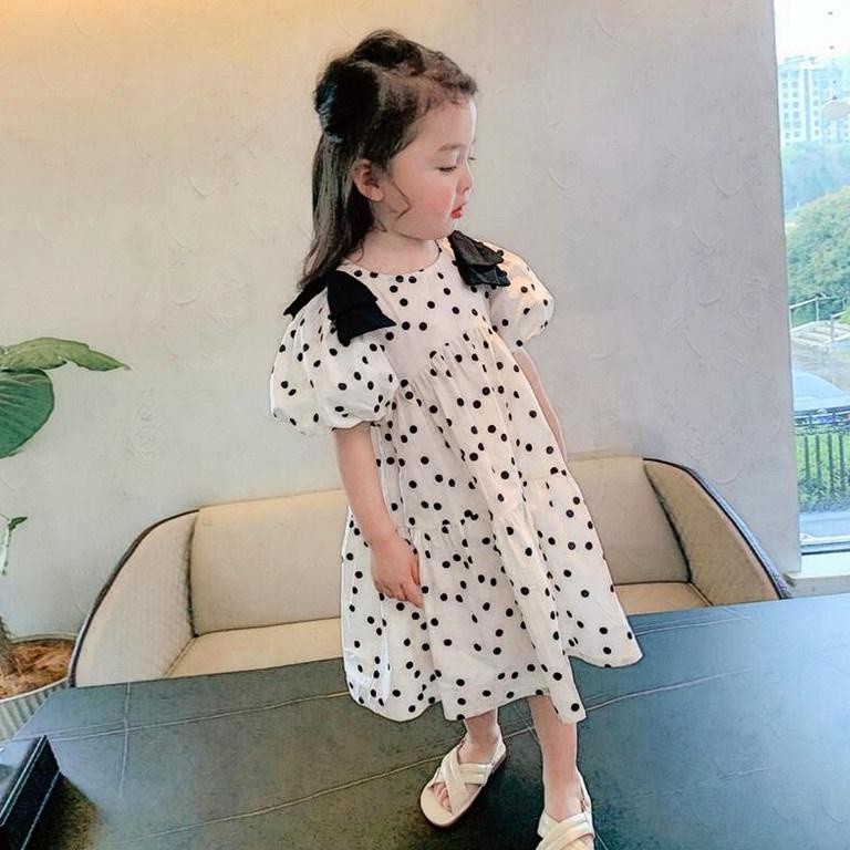 Đầm công chúa tay phồng cổ tròn họa tiết chấm bi cho bé gái