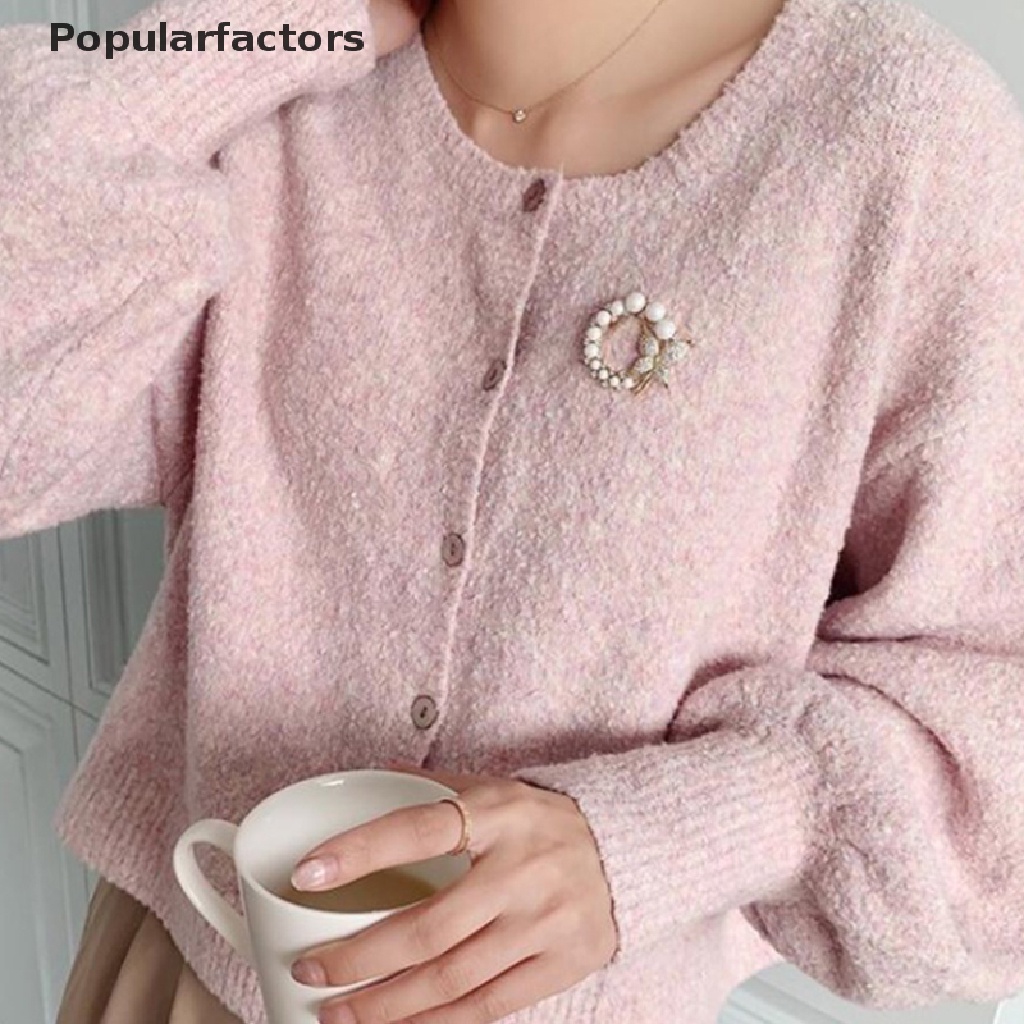 Ghim cài áo hình bướm và ngọc trai thanh lịch