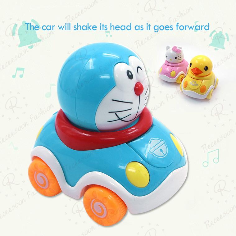 Xe đồ chơi lắc tạo hình Doraemon cho bé