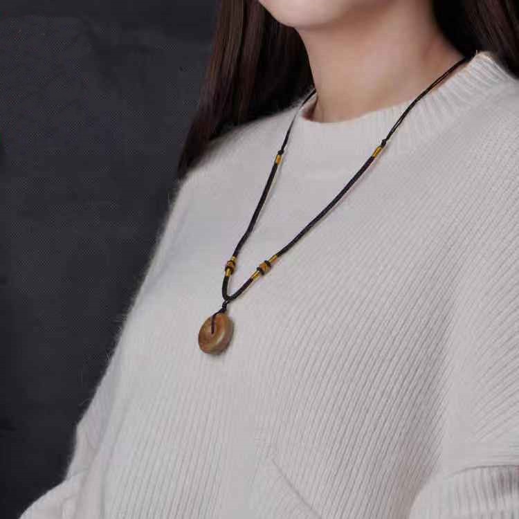 Vòng cổ trầm hương mặt tròn Bình An - Nha Trang Việt Nam Thành Tín Trầm Hương