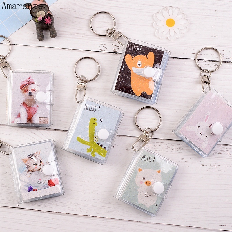 Album Ảnh 1 Inch 16 Ngăn Trong Suốt Lấp Lánh Kèm Móc Khóa