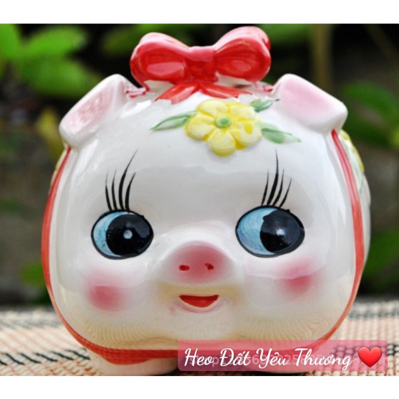 Lợn đất heo nơ hoa nổi tiết kiệm mẫu mới nhất