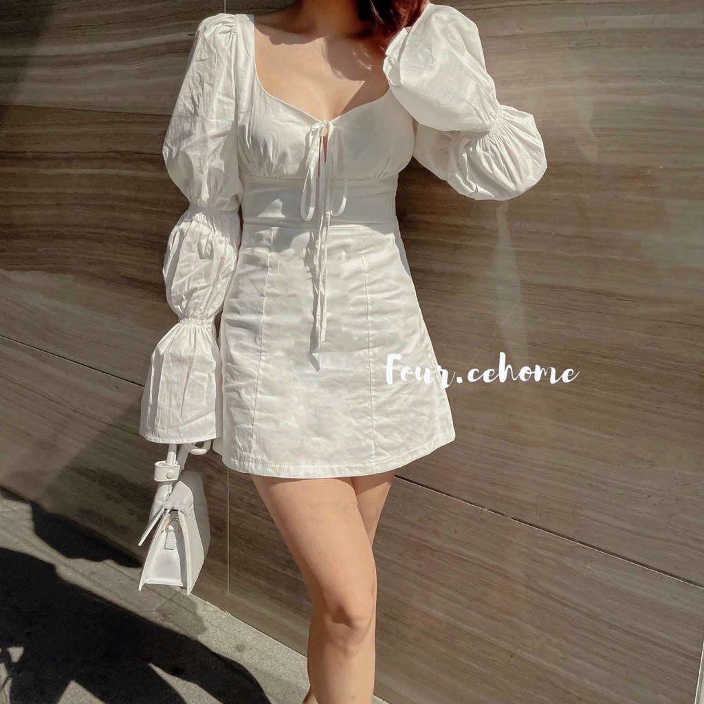 Đầm trắng tay nhún nơ nhỏ nhắn