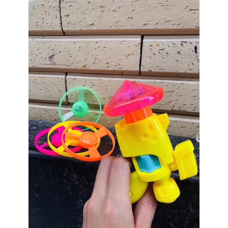 Súng con quay vặn cót mẫu mới cho bé