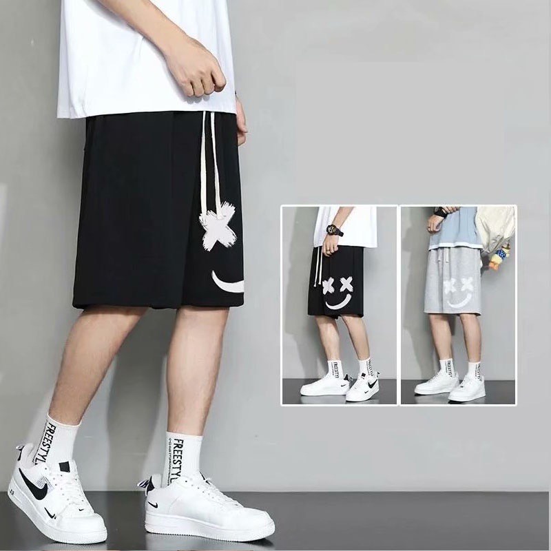 Quần short in hình mặt cười