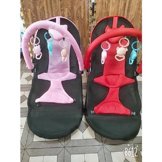 Ghế nhún bập bênh có đồ chơi gối đầu