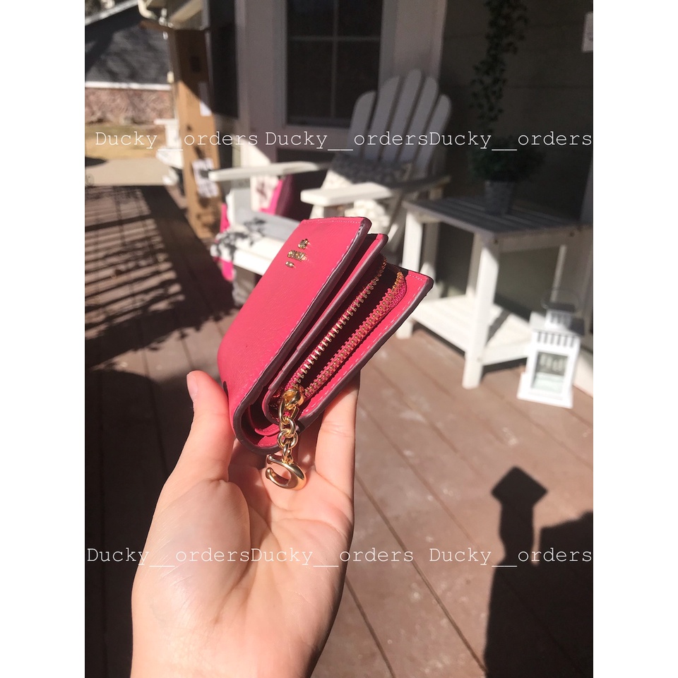 - ví coach snap wallet hồng