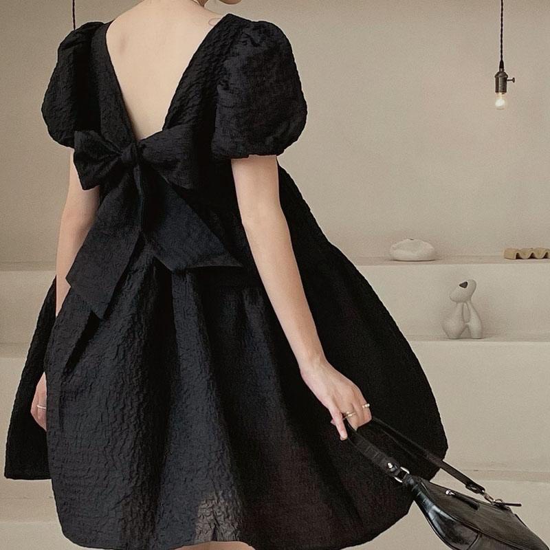 Váy đầm babydoll phồng thắt nơ hở lưng chất vải xốp