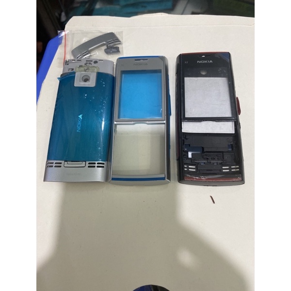 Vỏ nokia x2-00 có xương không phím hoặc vỏ kèm phím đầy đủ màu đen và bạc