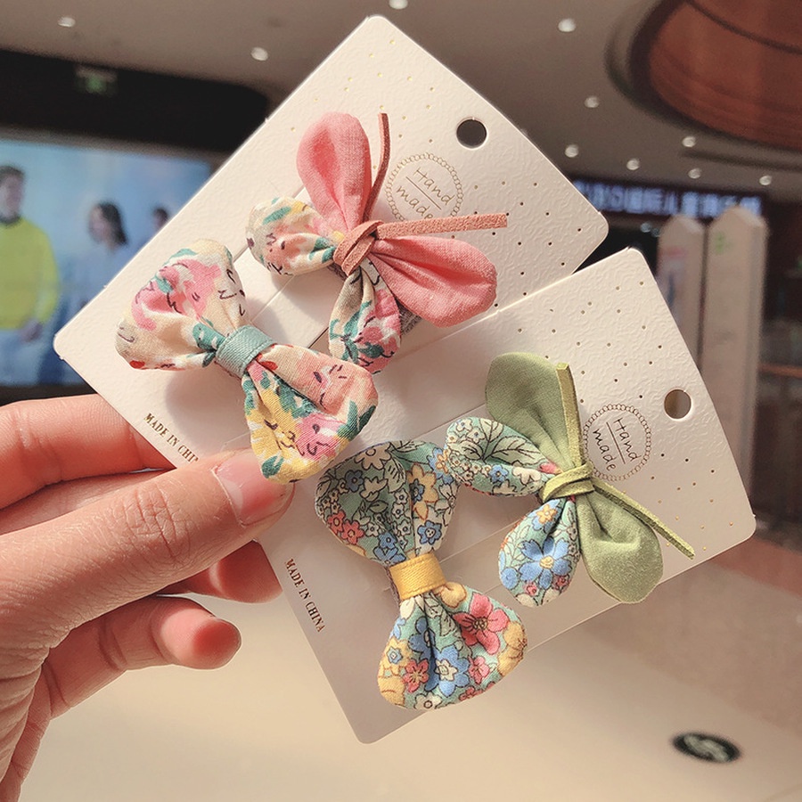 Set 2 kẹp tóc nơ kiểu dáng xinh xắn cho bé