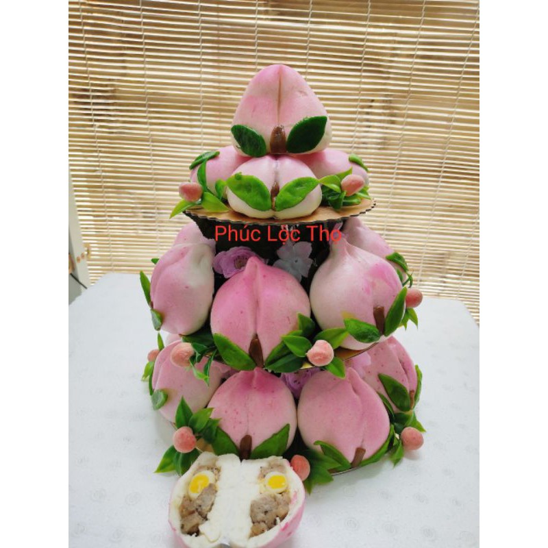 10 bánh bao trái đào nhân thịt trứng 130g trang trí lá từng bánh