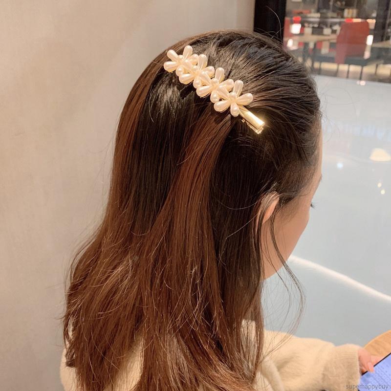 Kẹp tóc hoa dễ thương cho bé gái