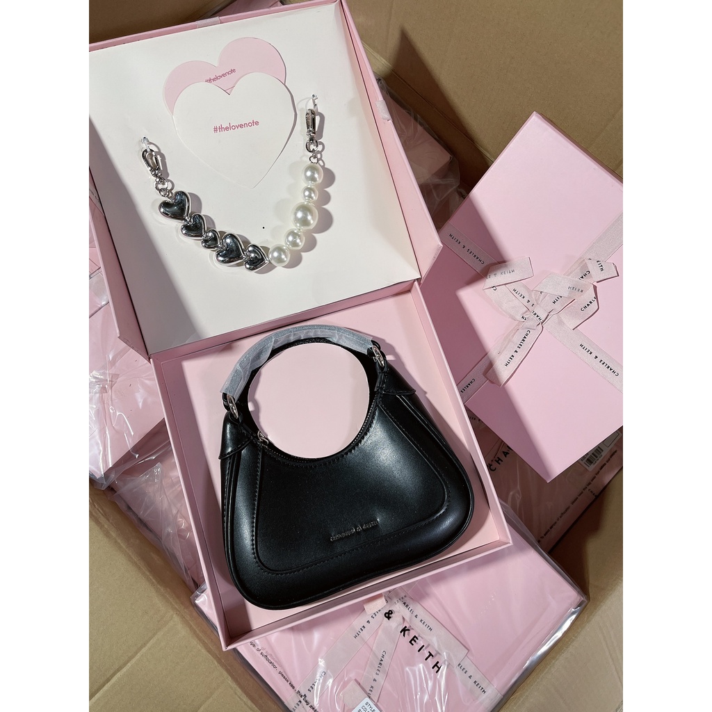 Túi CNK Dáng Bầu Đeo Vai Màu Hồng Baby Kèm Chuỗi Ngọc FullBox