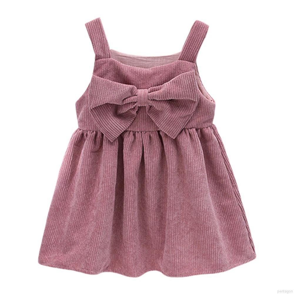 Đầm xòe 2 dây vải nhung đính nơ dễ thương cho bé gái 2-8 tuổi