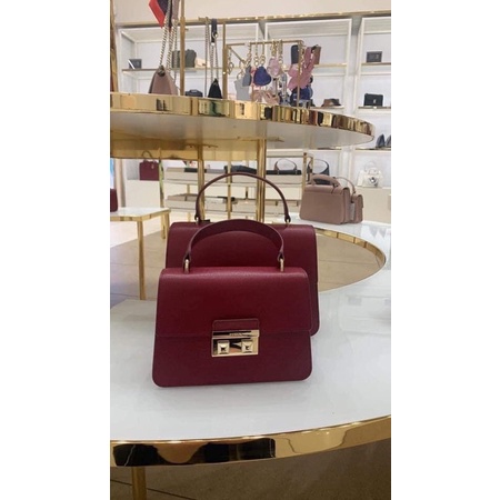 Miếng dán khoá túi Fl top b.e.l.l.a