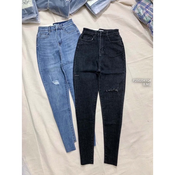 Quần jeans rách lai