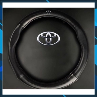 Bọc vô lăng vân carbon xe toyota
