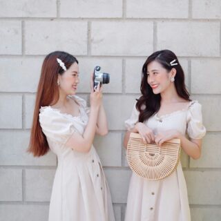 Đầm caro nút gỗ tay phồng