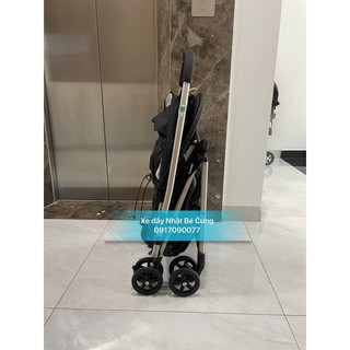 xe đẩy combi mechacal first white lable đen phối mái