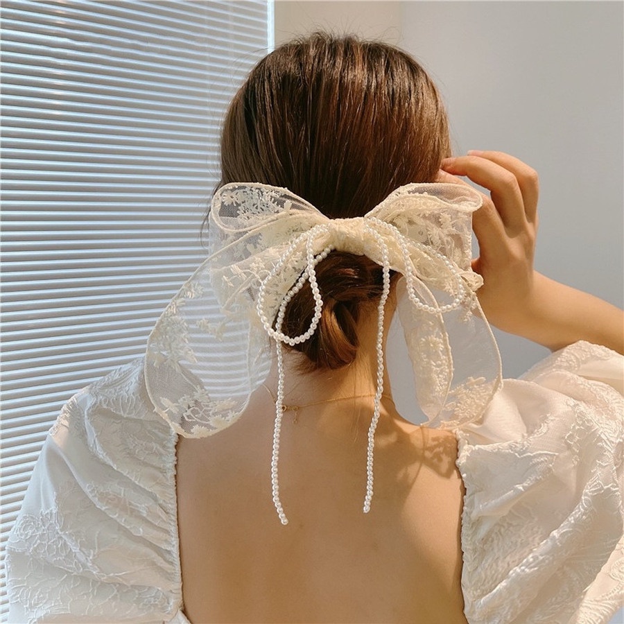Kẹp tóc đính ngọc trai nhân tạo hình nơ hợp thời trang cho nữ