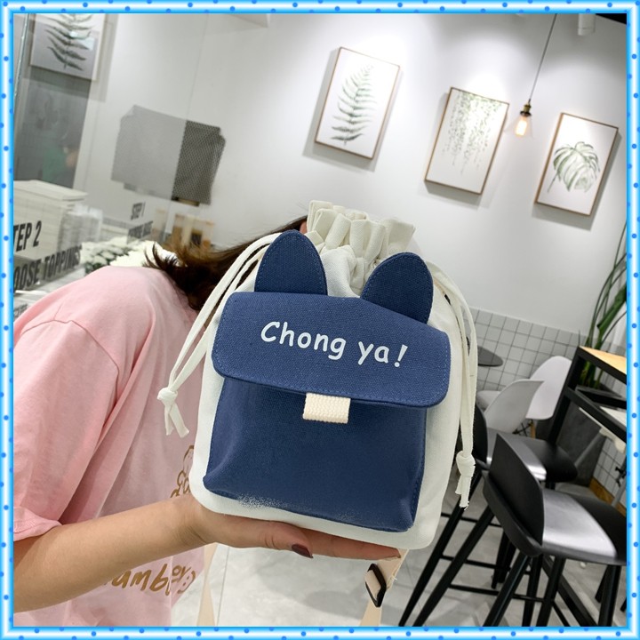 Túi đeo chéo dây rút trơn dễ thương tặng móc khóa bông