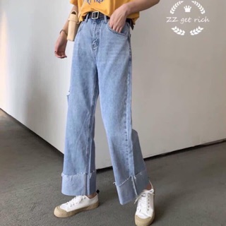 Quần jeans gập gấu rách hông