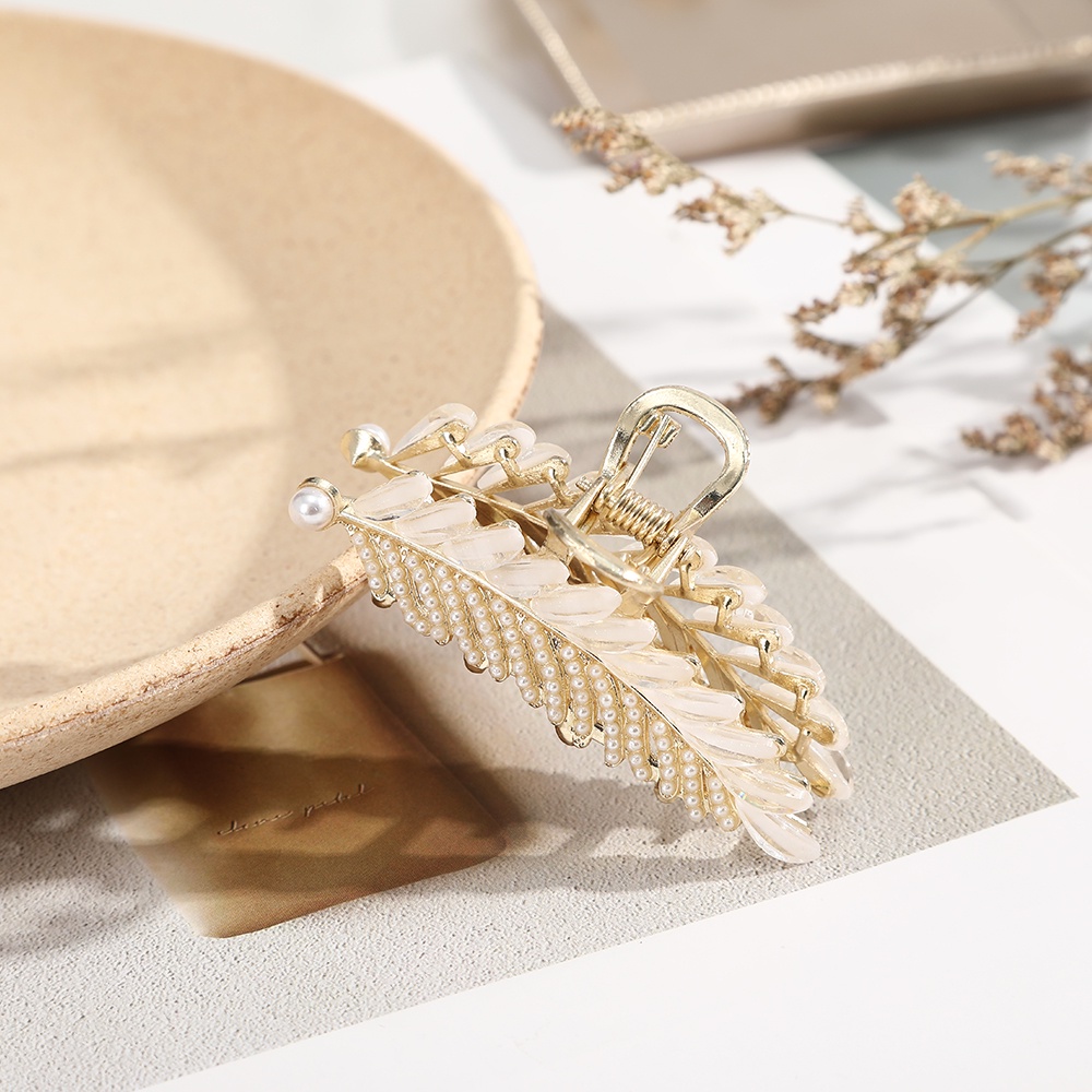 Kẹp tóc kim loại đính đá lấp lánh